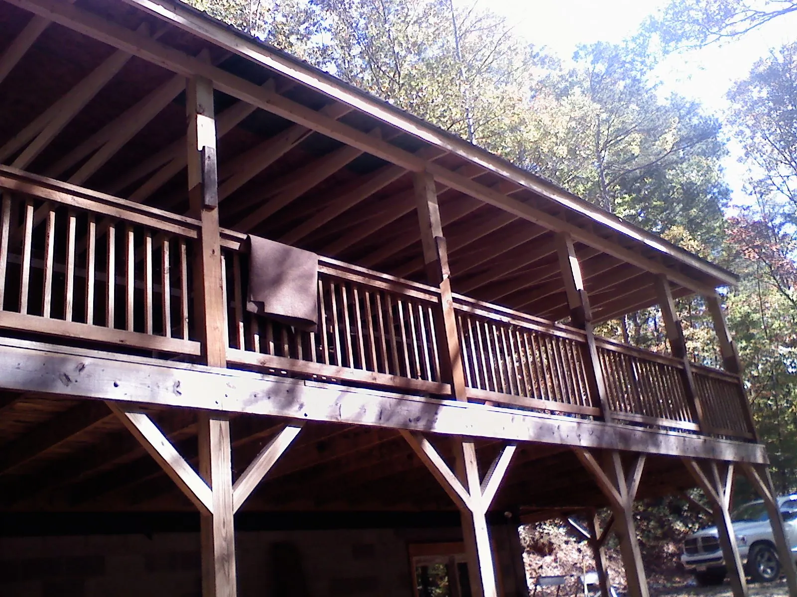 Timber framing under a new elevated porch and deck — Roof Leak Repair in Mount Morris by Roofing Brothers